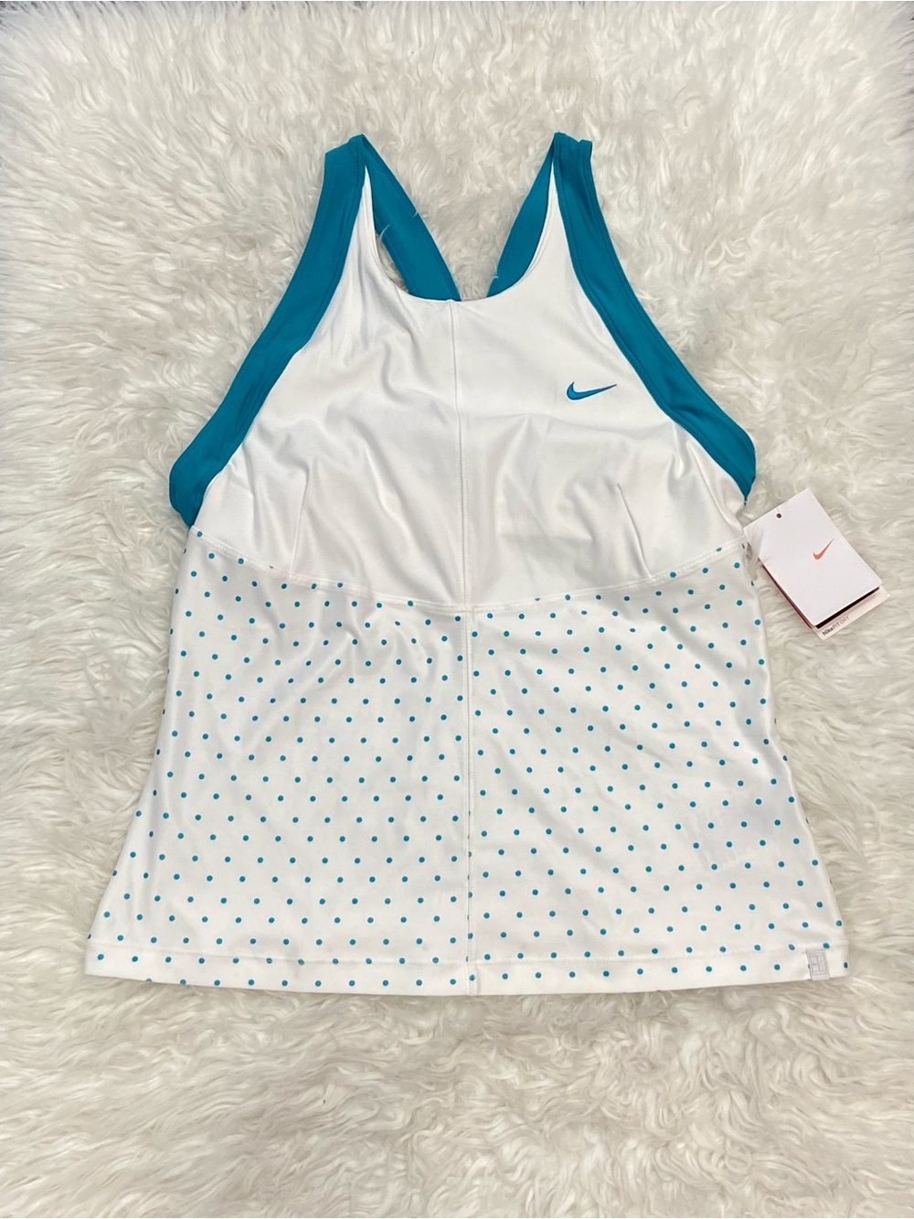 Nike Dri-FIT racerback tank top with a built-in shelf bra